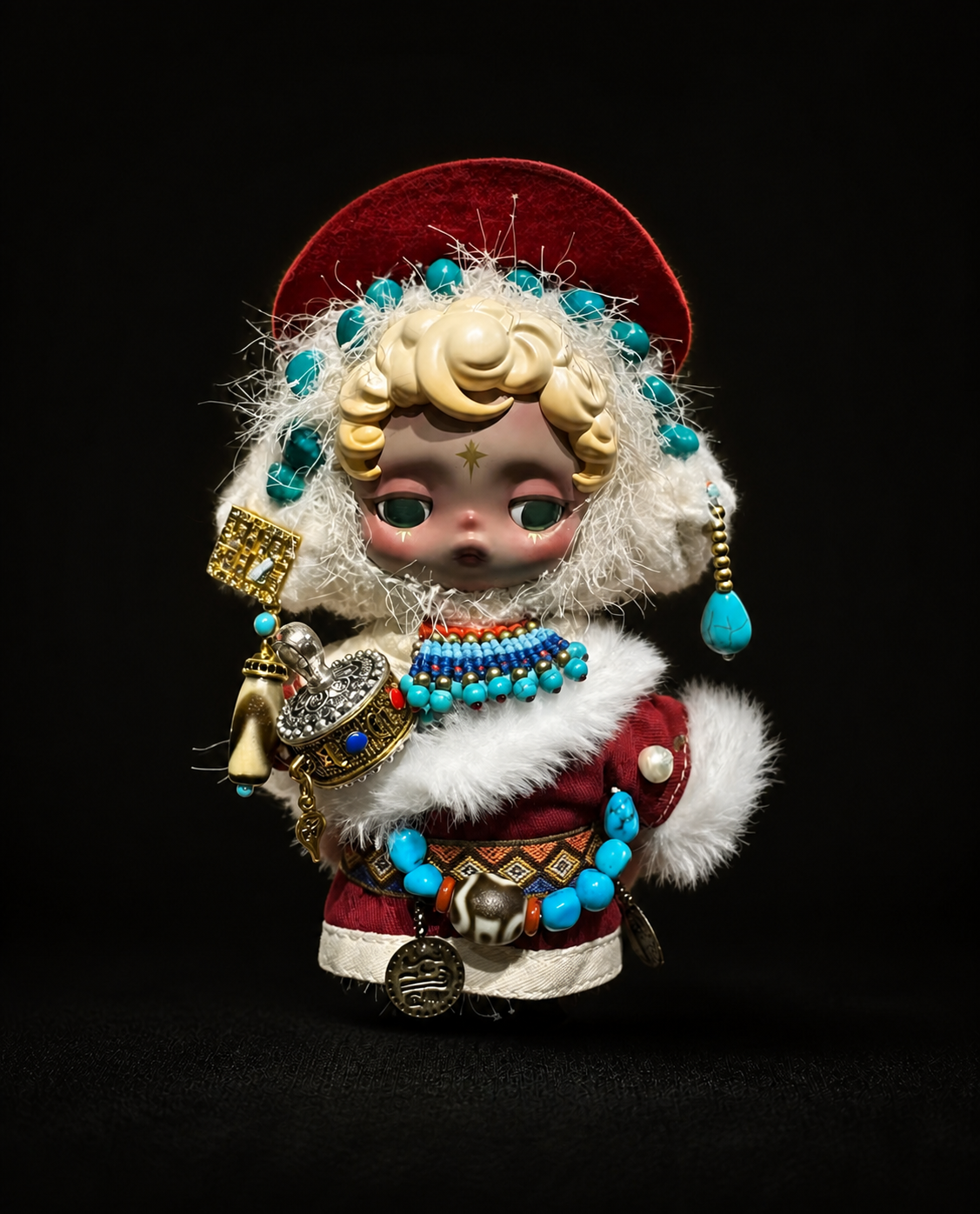 Collectible figure styling with turquoise beadwork in the obsidian studio