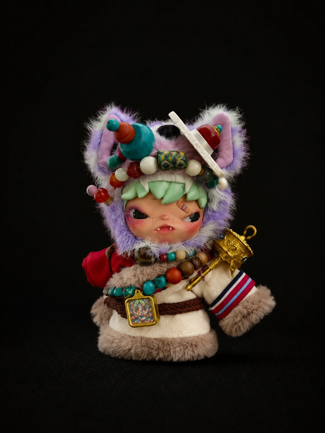 TIRAVA independently customised character with violet plush, mint-colour details and layered beadwork