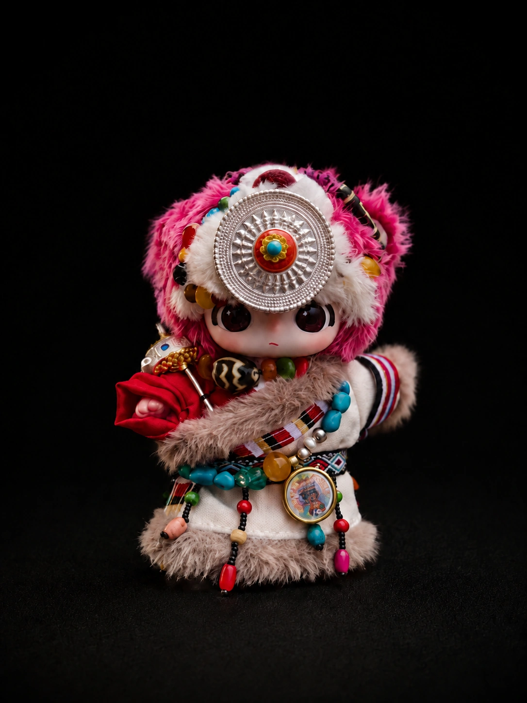 TIRAVA independently customised rose and white plush character with circular silver-tone ornament and colourful beadwork